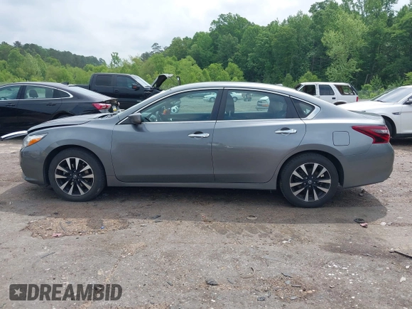 2018 Nissan Altima SR with VIN 1N4AL3AP6JC267111, listed as a IAAI auction lot 42070413 with 117,954 mi miles and . Bid and sale history available at carsss.com. Image 14.