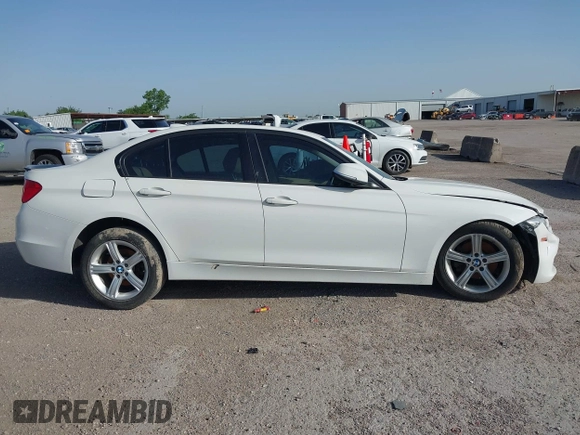 2014 BMW 3 Series 328i with VIN WBA3A5G5XENP32345, listed as a IAAI auction lot 42303835 with 100,235 mi miles and . Bid and sale history available at DreamBid. Image 13.
