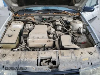 1990 Chevrolet Corsica z VIN 1G1LT54T5LY175073, wystawiony jako Copart lot #71889604 z przebiegiem 111 578 mil mil oraz Tytuł czysty. Historia ofert i sprzedaży dostępna na DreamBid. Obrazek 11.