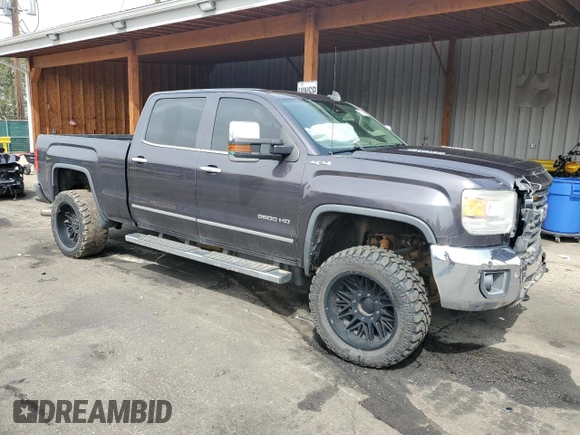 2015 GMC Sierra 2500HD SLT with VIN 1GT12ZE85FF589148, listed as a Copart auction lot 51329515 with 194,378 mi miles and Salvage title. Bid and sale history available at DreamBid. Image 4.
