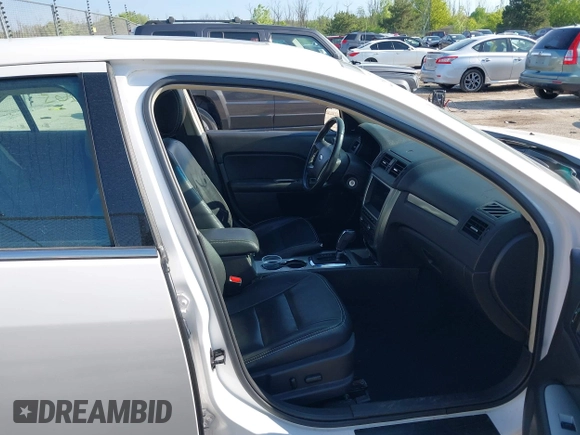 2012 Ford Fusion Hybrid with VIN 3FADP0L38CR255511, listed as a IAAI auction lot 42381063 with 82,083 mi miles and . Bid and sale history available at DreamBid. Image 5.