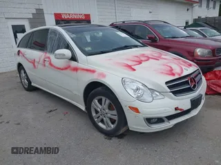 2009 Mercedes-Benz R 3.5L z VIN 4JGCB65E09A092437, wystawiony jako IAAI lot #41827079 z przebiegiem 167 543 mil mil oraz . Historia ofert i sprzedaży dostępna na DreamBid. Obrazek 1.