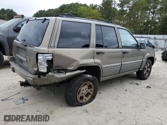 1997 Jeep Grand Cherokee Limited with VIN 1J4GZ78Y0VC599554, listed as a Copart auction lot 72006854 with 321,283 mi miles and Salvage Title. Bid and sale history available at carsss.com. Image 3.