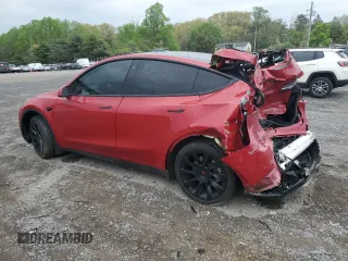 2023 Tesla Model Y Long Range z VIN 7SAYGAEE1PF690008, wystawiony jako Copart lot #54441735 z przebiegiem 38 291 mil mil oraz Szkody całkowita. Historia ofert i sprzedaży dostępna na DreamBid. Obrazek 2.