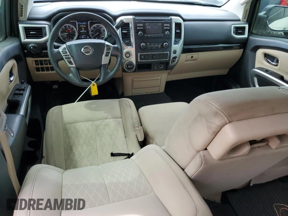 2017 Nissan Titan SV z VIN 1N6AA1EJ2HN570490, wystawiony jako Copart lot #50688785 z przebiegiem 122 817 mil mil oraz Szkoda całkowita • Salvage title. Historia ofert i sprzedaży dostępna na DreamBid. Obrazek 8.