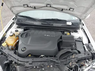 2012 Chrysler 200 S with VIN 1C3CCBHG3CN308745, listed as a IAAI auction lot 41907963 with 104,054 mi miles. Bid and sale history available at carsss.com. Image 10.