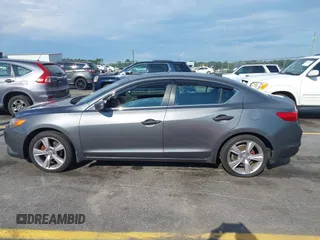 2014 Acura ILX z VIN 19VDE1F39EE002881, wystawiony jako IAAI lot #42270605 z przebiegiem 172 356 mil mil oraz . Historia ofert i sprzedaży dostępna na DreamBid. Obrazek 14.