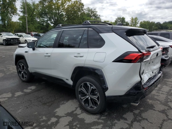 2024 Toyota RAV4 Prime XSE with VIN JTMFB3FVXRD173281, listed as a Copart auction lot 69412264 with 5,949 mi miles and Salvage Title. Bid and sale history available at carsss.com. Image 2.