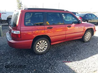 2002 Subaru Forester S w/Premium Pkg with VIN JF1SF656X2H757330, listed as a IAAI auction lot 41758034 with 228,297 mi miles. Bid and sale history available at carsss.com. Image 4.
