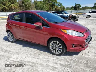2017 Ford Fiesta Titanium with VIN 3FADP4FJXHM171163, listed as a Copart auction lot 77911114 with 80,171 mi miles and Salvage Title. Bid and sale history available at DreamBid. Image 4.
