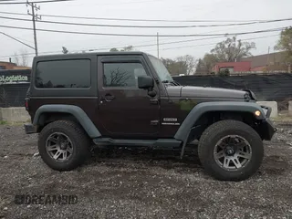 2013 Jeep Wrangler Sport with VIN 1C4AJWAG5DL679350, listed as a IAAI auction lot 40893582 with 61,191 mi miles and . Bid and sale history available at carsss.com. Image 13.