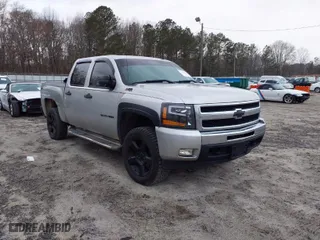 2010 Chevrolet Silverado 1500 LT with VIN 3GCRKSE33AG151556, listed as a IAAI auction lot 41618822 with 169,085 mi miles. Bid and sale history available at carsss.com. Image 1.