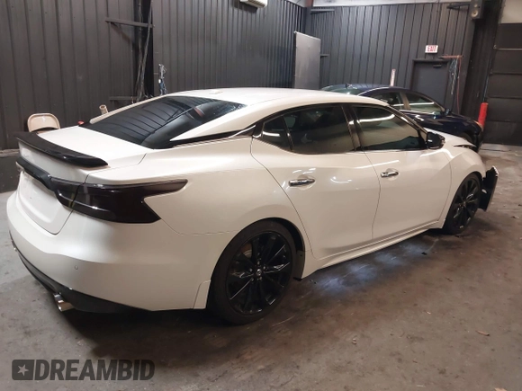 2016 Nissan Maxima SL with VIN 1N4AA6AP2GC439621, listed as a IAAI auction lot 41745052 with 23,484 mi miles and . Bid and sale history available at DreamBid. Image 4.