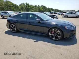 2023 Audi RS 5 Sportback z VIN WUAAWCF54PA900981, wystawiony jako Copart lot #62860383 z przebiegiem 4779 mil mil oraz . Historia ofert i sprzedaży dostępna na DreamBid. Obrazek 4.