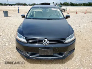 2013 Volkswagen Jetta SE with VIN 3VWDX7AJ3DM434233, listed as a Copart auction lot 60697485 with 74,333 mi miles and Salvage title. Bid and sale history available at DreamBid. Image 5.