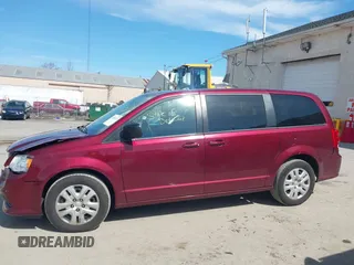 2018 Dodge Grand Caravan SE Plus with VIN 2C4RDGBG2JR188185, listed as a IAAI auction lot 41832570 with 80,072 mi miles and . Bid and sale history available at DreamBid. Image 14.