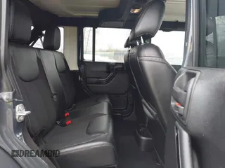 2017 Jeep Wrangler Unlimited Sahara with VIN 1C4BJWEG3HL569143, listed as a IAAI auction lot 41986188 with 27,495 mi miles. Bid and sale history available at carsss.com. Image 8.