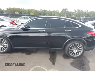 2019 Mercedes-Benz GLC 300 with VIN WDC0J4KB0KF667213, listed as a IAAI auction lot 40422288 with 56,488 mi miles and . Bid and sale history available at DreamBid. Image 14.