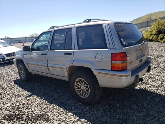 1994 Jeep Grand Cherokee Limited with VIN 1J4GZ78Y0RC190766, listed as a Copart auction lot 54628055 with 217,270 mi miles and Salvage title. Bid and sale history available at DreamBid. Image 2.