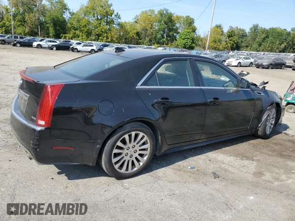 2011 Cadillac CTS Performance with VIN 1G6DK5ED8B0152456, listed as a Copart auction lot 71182634 with Not Provided miles and Salvage Title. Bid and sale history available at DreamBid. Image 3.