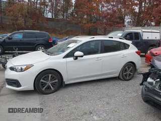 2020 Subaru Impreza Premium z VIN 4S3GTAV65L3706134, wystawiony jako IAAI lot #40711288 z przebiegiem 56 288 mil mil oraz . Historia ofert i sprzedaży dostępna na DreamBid. Obrazek 15.