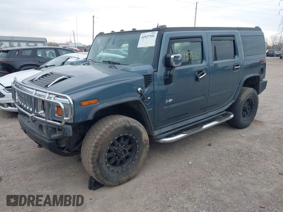 2005 Hummer H2 SUV z VIN 5GRGN23U95H100888, wystawiony jako IAAI lot #41937351 z przebiegiem 202 969 mil mil oraz . Historia ofert i sprzedaży dostępna na DreamBid. Obrazek 2.