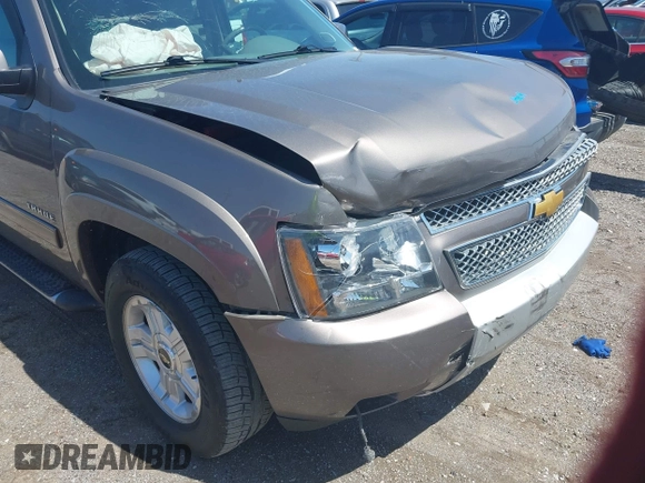 2013 Chevrolet Tahoe LT with VIN 1GNSKBE09DR325729, listed as a IAAI auction lot 41989587 with 186,361 mi miles and . Bid and sale history available at DreamBid. Image 6.