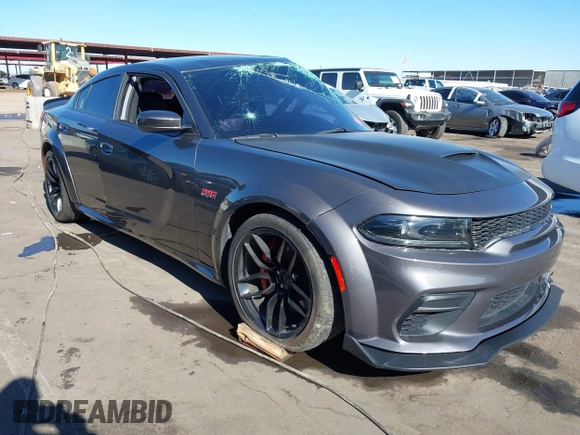 2022 Dodge Charger Scat Pack Widebody with VIN 2C3CDXGJ1NH204130, listed as a IAAI auction lot 41392893 with 9,515 mi miles and . Bid and sale history available at DreamBid. Image 1.