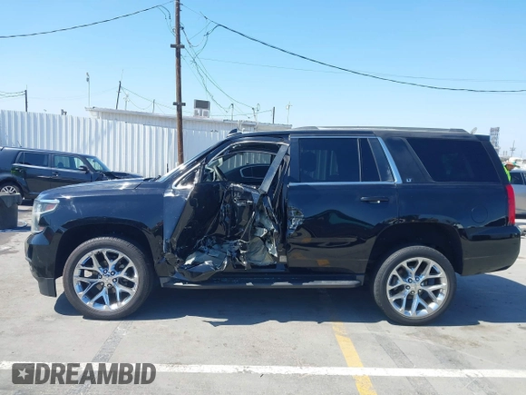 2016 Chevrolet Tahoe LT z VIN 1GNSCBKC7GR311313, wystawiony jako IAAI lot #42303467 z przebiegiem 90 889 mil mil oraz . Historia ofert i sprzedaży dostępna na DreamBid. Obrazek 15.