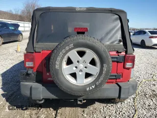 2012 Jeep Wrangler Sport with VIN 1C4AJWAGXCL194071, listed as a Copart auction lot 48008795 with 109,658 mi miles and Salvage title. Bid and sale history available at DreamBid. Image 6.