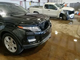 2015 Land Rover Range Rover Evoque Pure Premium with VIN SALVR2BG7FH013901, listed as a Copart auction lot 56415195 with 176,920 mi miles and Salvage title. Bid and sale history available at DreamBid. Image 15.