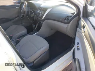 2016 Hyundai Accent SE z VIN KMHCT4AE0GU062891, wystawiony jako IAAI lot #40989721 z przebiegiem 128 457 mil mil oraz . Historia ofert i sprzedaży dostępna na DreamBid. Obrazek 5.