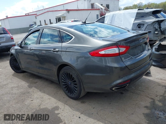 2015 Ford Fusion Titanium with VIN 3FA6P0K96FR283763, listed as a IAAI auction lot 42046868 with 104,542 mi miles. Bid and sale history available at carsss.com. Image 3.