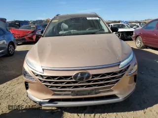 2019 Hyundai NEXO Limited z VIN KM8J84A67KU001483, wystawiony jako Copart lot #77165764 z przebiegiem 112 305 mil mil oraz Szkoda całkowita • Salvage title. Historia ofert i sprzedaży dostępna na DreamBid. Obrazek 5.