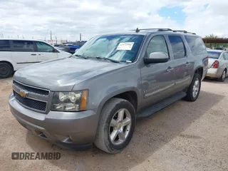 2007 Chevrolet Suburban LT with VIN 1GNFK16327J242103, listed as a IAAI auction lot 42172990 with 185,103 mi miles and . Bid and sale history available at DreamBid. Image 2.