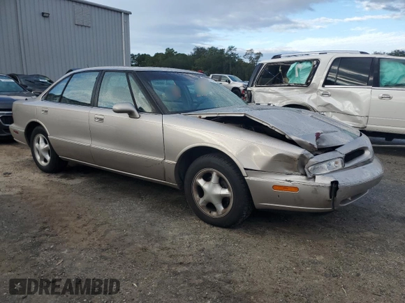 1997 Oldsmobile LSS z VIN 1G3HY52K9V4823565, wystawiony jako Copart lot #73965744 z przebiegiem 74 973 mil mil oraz Szkody całkowita. Historia ofert i sprzedaży dostępna na DreamBid. Obrazek 4.