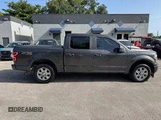 2019 Ford F-150 XL with VIN 1FTEW1CP1KKF22890, listed as a Copart auction lot 61813095 with 63,774 mi miles and Salvage title. Bid and sale history available at DreamBid. Image 13.