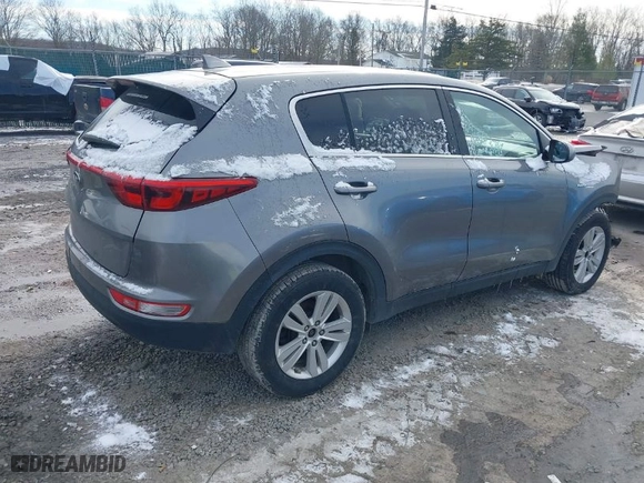 2017 Kia Sportage LX with VIN KNDPMCACXH7129086, listed as a IAAI auction lot 41218449 with 112,138 mi miles. Bid and sale history available at carsss.com. Image 4.