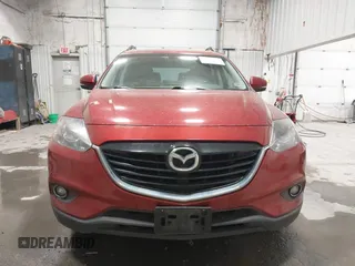 2015 Mazda CX-9 Grand Touring z VIN JM3TB3DAXF0464215, wystawiony jako IAAI lot #42043092 z przebiegiem 119 269 mil mil oraz . Historia ofert i sprzedaży dostępna na DreamBid. Obrazek 12.
