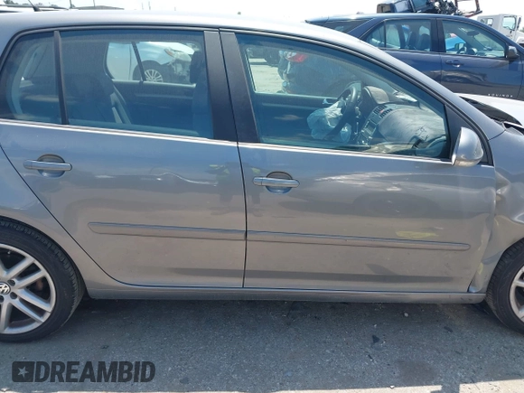 2009 Volkswagen Rabbit S z VIN WVWDA71K39W083764, wystawiony jako IAAI lot #42051848 z przebiegiem 164 403 mil mil oraz . Historia ofert i sprzedaży dostępna na DreamBid. Obrazek 13.