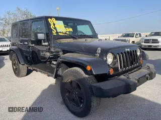 2008 Jeep Wrangler Unlimited Sahara with VIN 1J8GA59148L530995, listed as a IAAI auction lot 41721406 with 167,611 mi miles and . Bid and sale history available at carsss.com. Image 1.