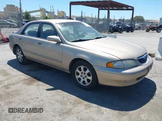 1999 Mazda 626 ES z VIN 1YVGF22C9X5893986, wystawiony jako IAAI lot #42218638 z przebiegiem 159 418 mil mil oraz . Historia ofert i sprzedaży dostępna na DreamBid. Obrazek 1.