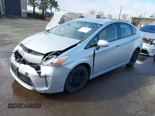 2015 Toyota Prius Four with VIN JTDKN3DUXF0482915, listed as a IAAI auction lot 41827372 with 125,830 mi miles. Bid and sale history available at carsss.com. Image 2.