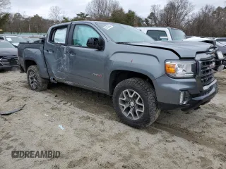 2022 GMC Canyon 4WD AT4 z VIN 1GTG6FENXN1274389, wystawiony jako Copart lot #85255404 z przebiegiem 42 843 mil mil oraz Szkoda całkowita • Salvage title. Historia ofert i sprzedaży dostępna na DreamBid. Obrazek 4.