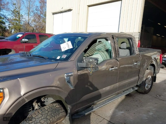 2021 Ford F-150 XL with VIN 1FTFW1E88MKE24484, listed as a IAAI auction lot 41655048 with 60,057 mi miles. Bid and sale history available at carsss.com. Image 6.