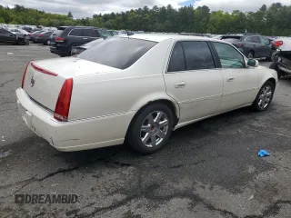 2007 Cadillac DTS V8 z VIN 1G6KD57Y57U215417, wystawiony jako Copart lot #57962455 z przebiegiem 87 592 mil mil oraz Tytuł czysty. Historia ofert i sprzedaży dostępna na DreamBid. Obrazek 3.