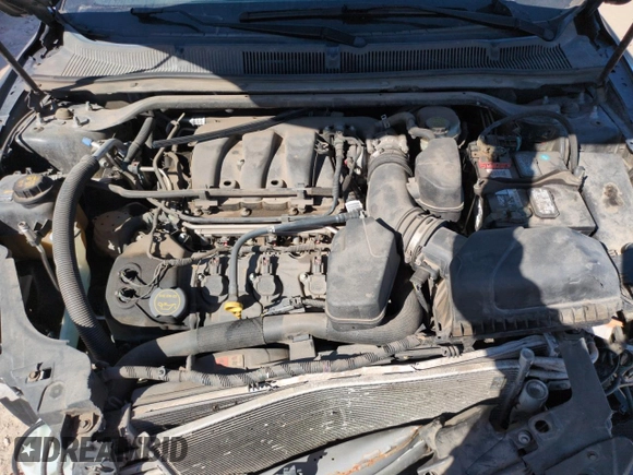 2015 Ford Taurus Limited with VIN 1FAHP2F85FG177916, listed as a Copart auction lot 49004365 with 129,486 mi miles and Salvage Title. Bid and sale history available at DreamBid. Image 11.