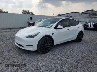 2022 Tesla Model Y Performance with VIN 7SAYGDEF1NF445085, listed as a Copart auction lot 58809495 with 14,832 mi miles and Salvage title. Bid and sale history available at DreamBid. Image 1.