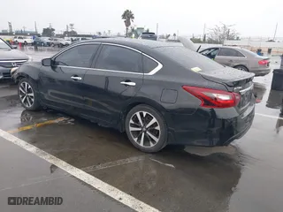 2018 Nissan Altima 2.5 SV with VIN 1N4AL3AP9JC117719, listed as a IAAI auction lot 41720521 with 103,541 mi miles. Bid and sale history available at carsss.com. Image 3.