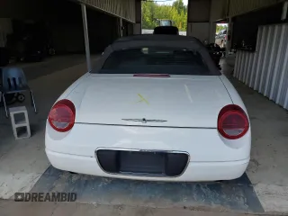 2002 Ford Thunderbird Hardtop Premium z VIN 1FAHP60A52Y130277, wystawiony jako Copart lot #69473594 z przebiegiem Nie podano mil oraz Szkoda całkowita • Salvage title. Historia ofert i sprzedaży dostępna na DreamBid. Obrazek 6.